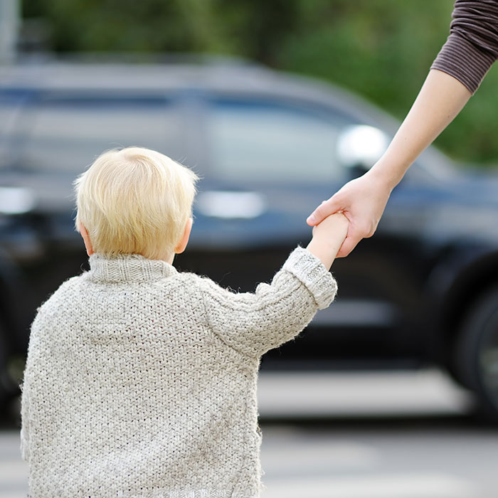 child at crosswalk